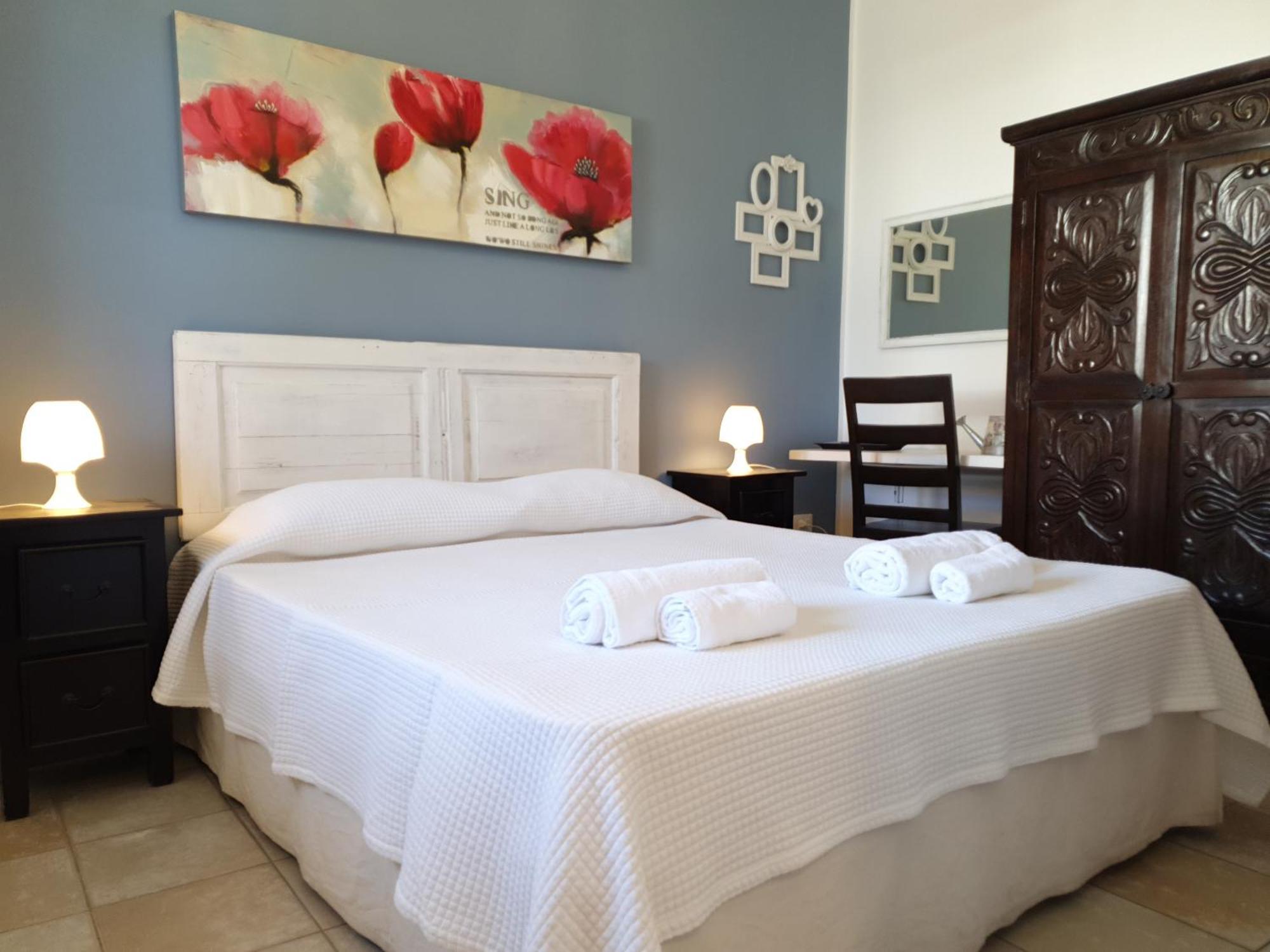 Blue Dolphin Guest House อาลเกโร ภายนอก รูปภาพ